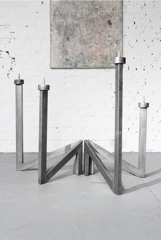 large modernist architectural 4-armed candlestick by the Belgian sculptor Roger Bonduel (1930-2019) in welded and patinated steel.