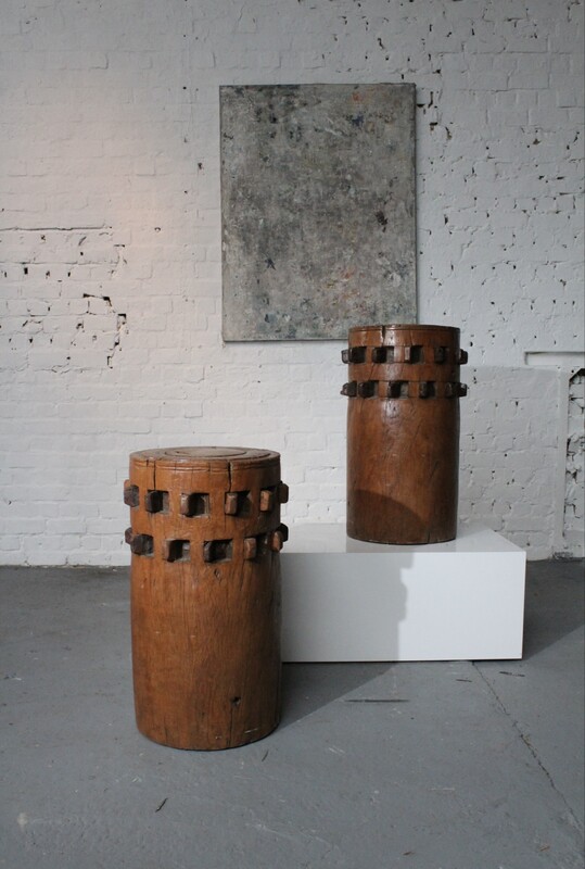 Pair of antique African sugar grinders, early 20th Century.