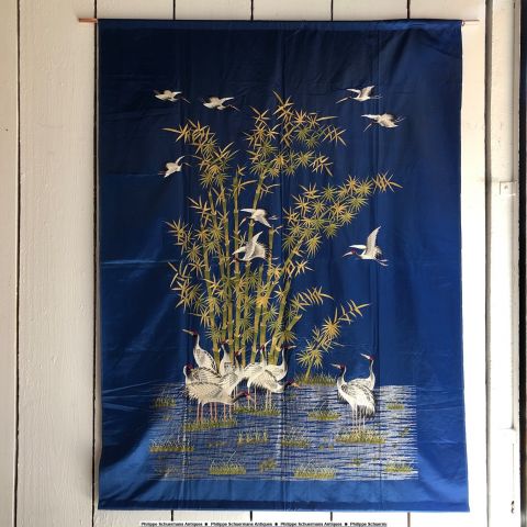 handmade embroidery , on a bleu silk background , circa 1880 , japonisant , attern of cranes or egrets in a bamboo decor for sell