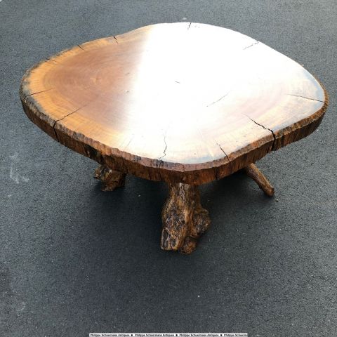 primitive tree trunk coffee table, nice shades of wood, around 1970 for sell